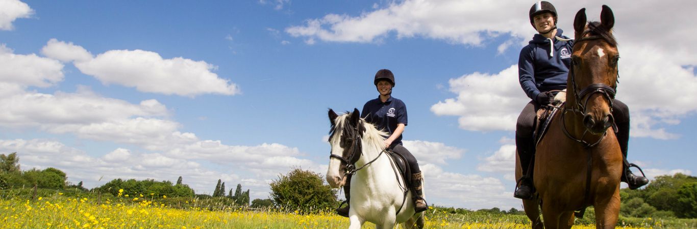 British Grooms Association Members Riding Horses